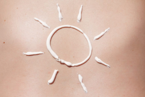 sun illustration in sunscreen on skin
